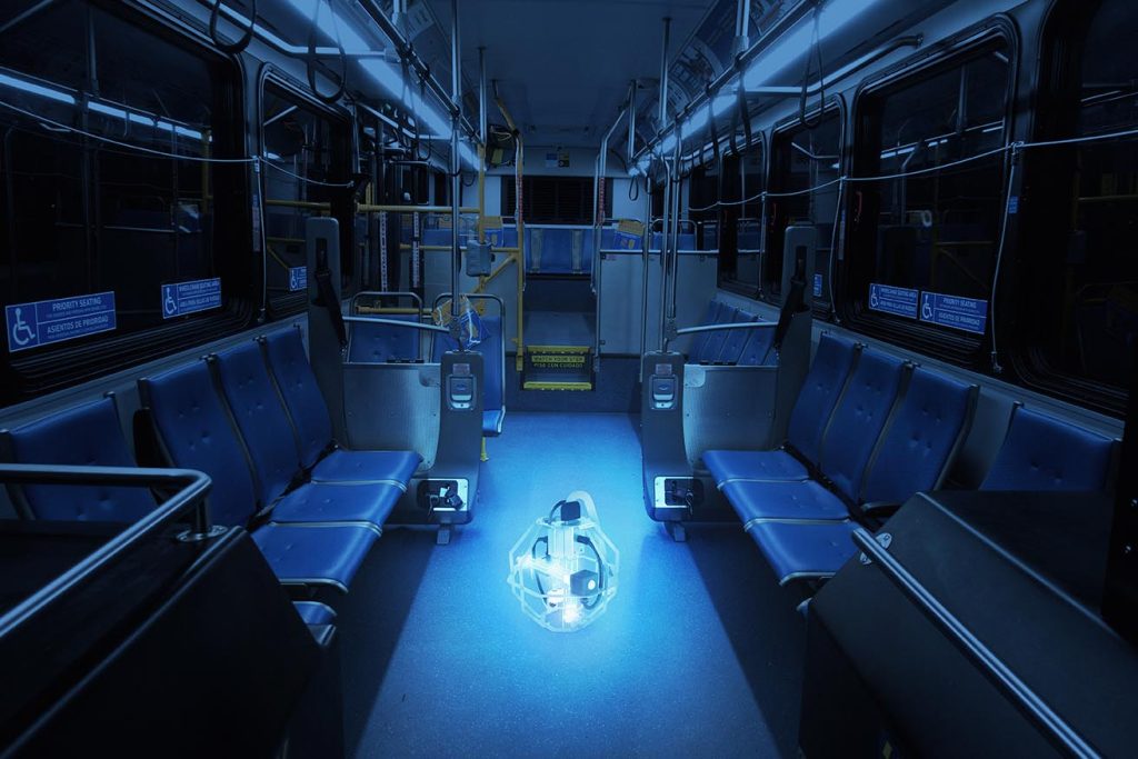 Interior of lighted city bus at night transit